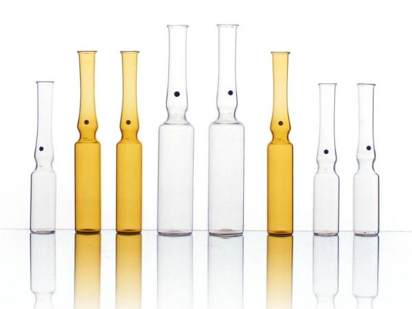 Several pharmaceutical glass ampoules are displayed.
